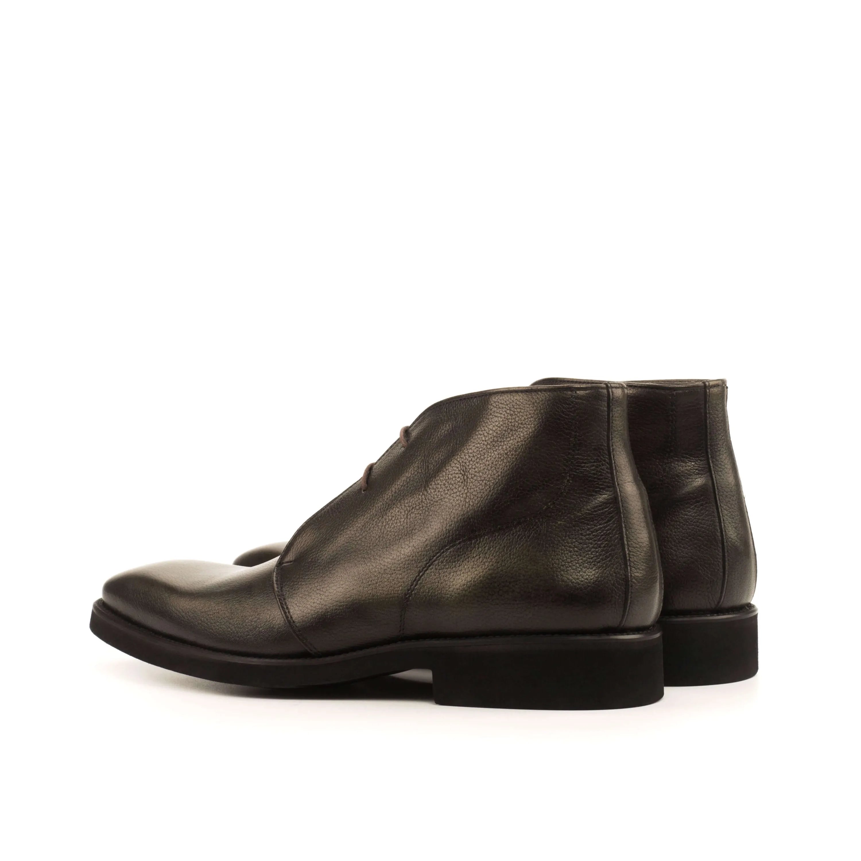 Chesmu chukka boots in rich brown leather with patina finish