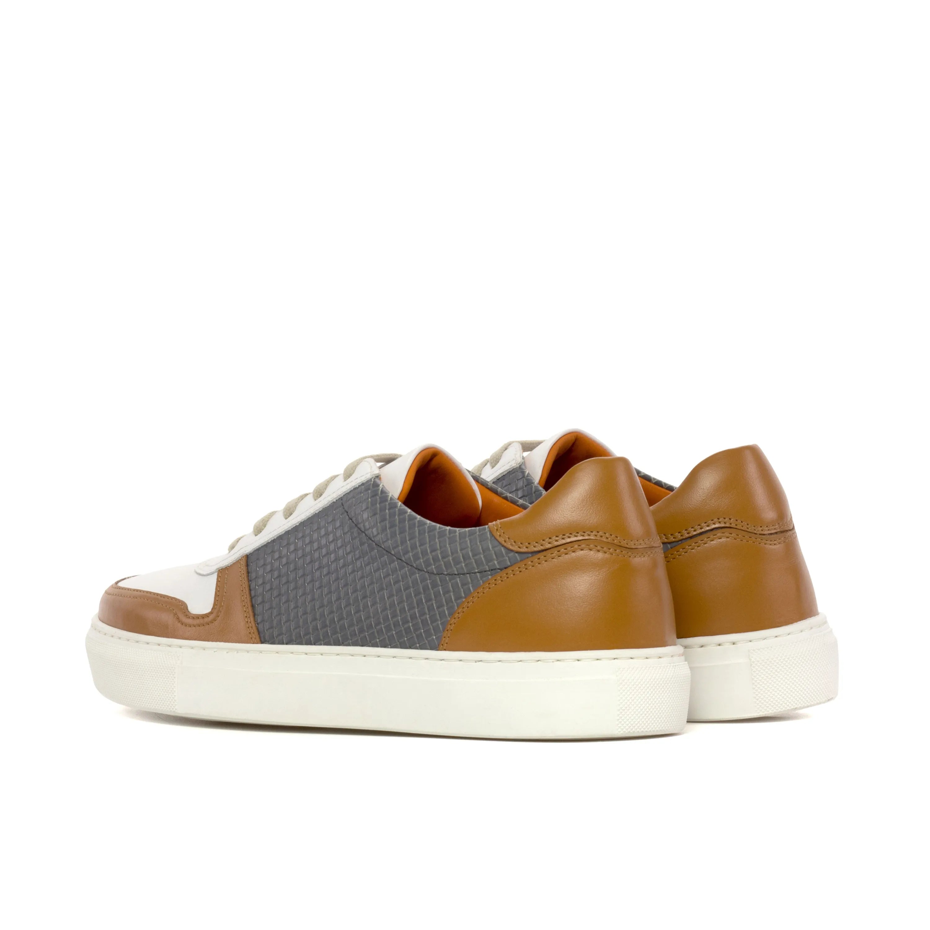 JiJi unisex trainer sneaker with two-toned leather and fabric cupsole