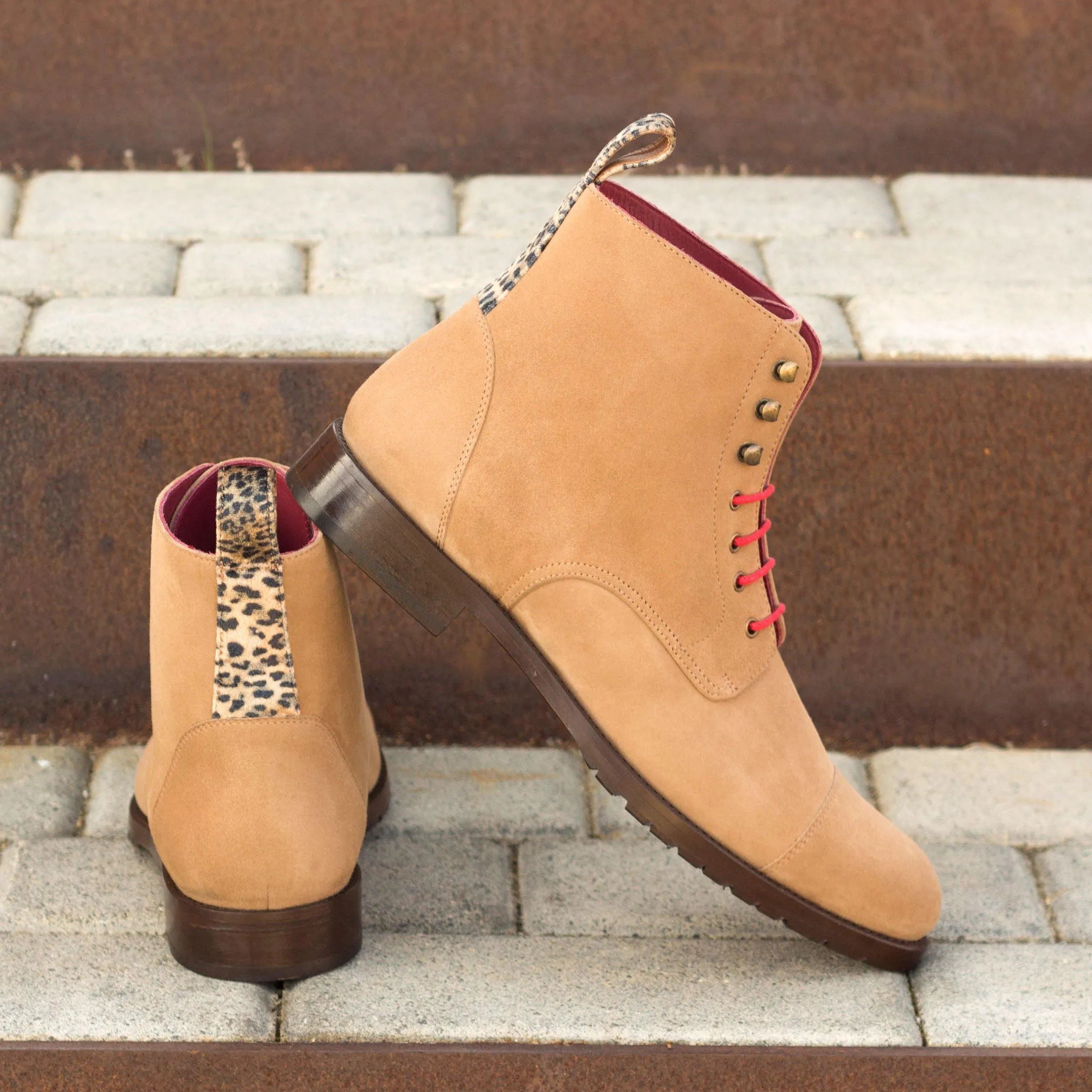 Back view of Lorrain ladies captoe boots II in tan suede with leopard pull tabs