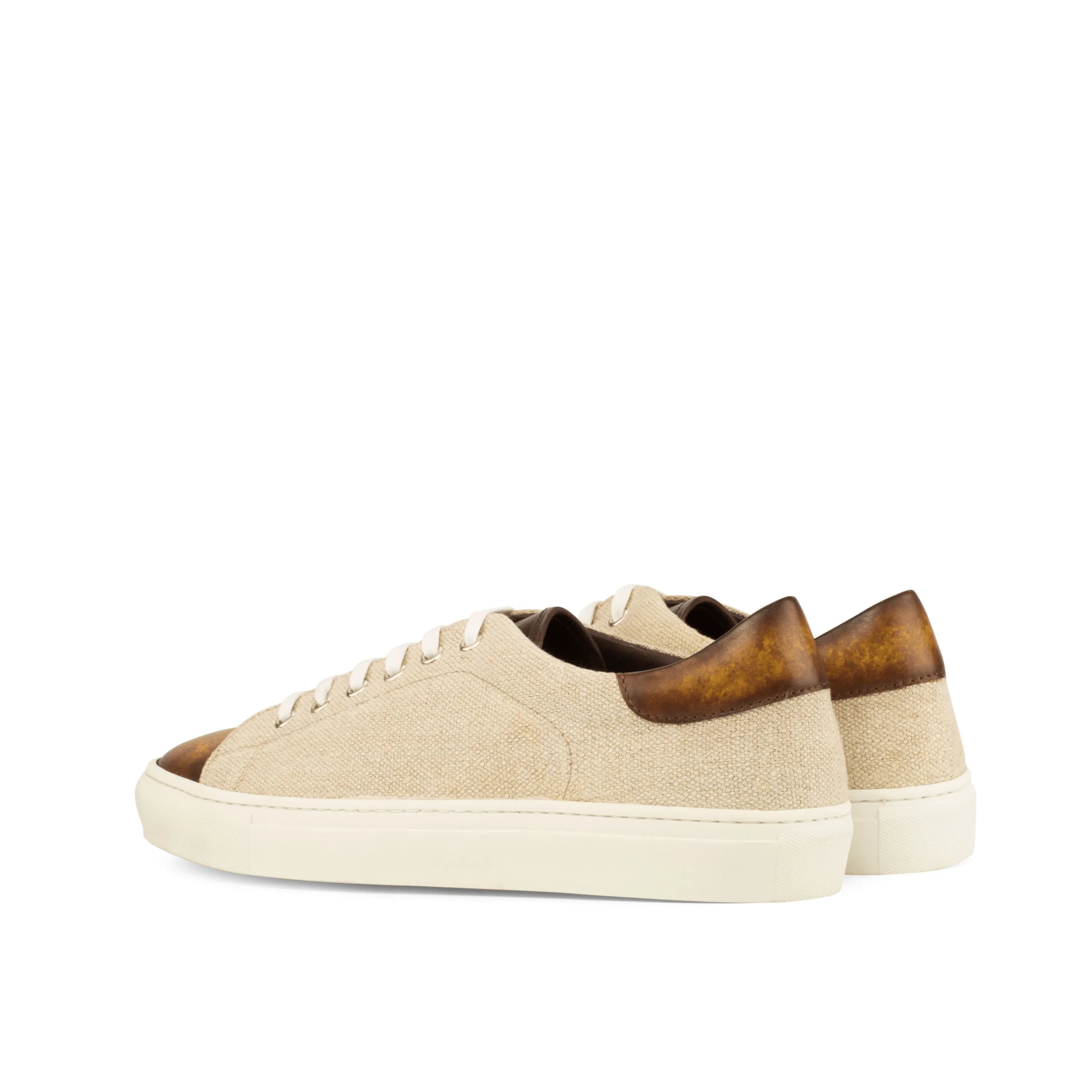 Makya Trainer Patina cupsole trainer in beige canvas with brown leather accents