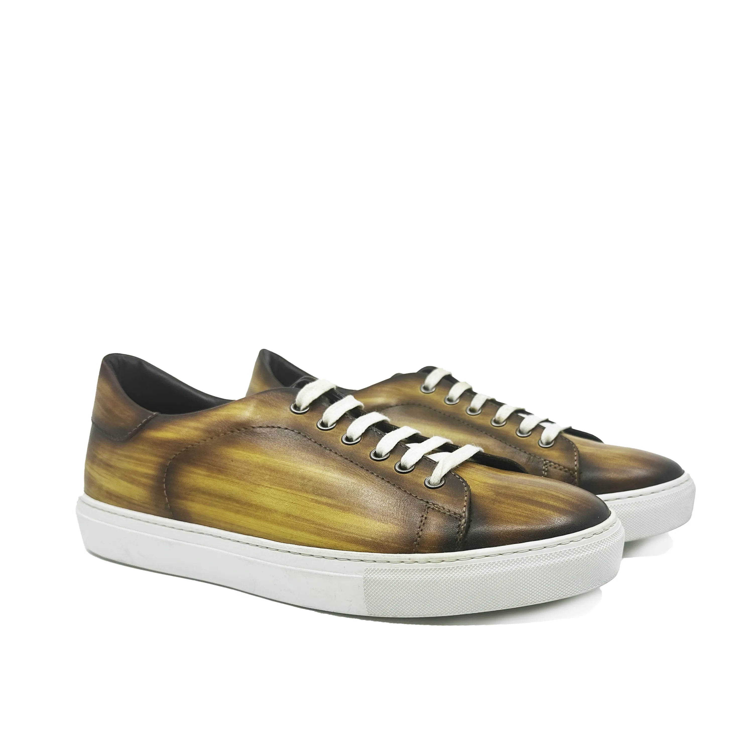 Brown Tanner Patina Trainer sneaker with white laces and cupsole design