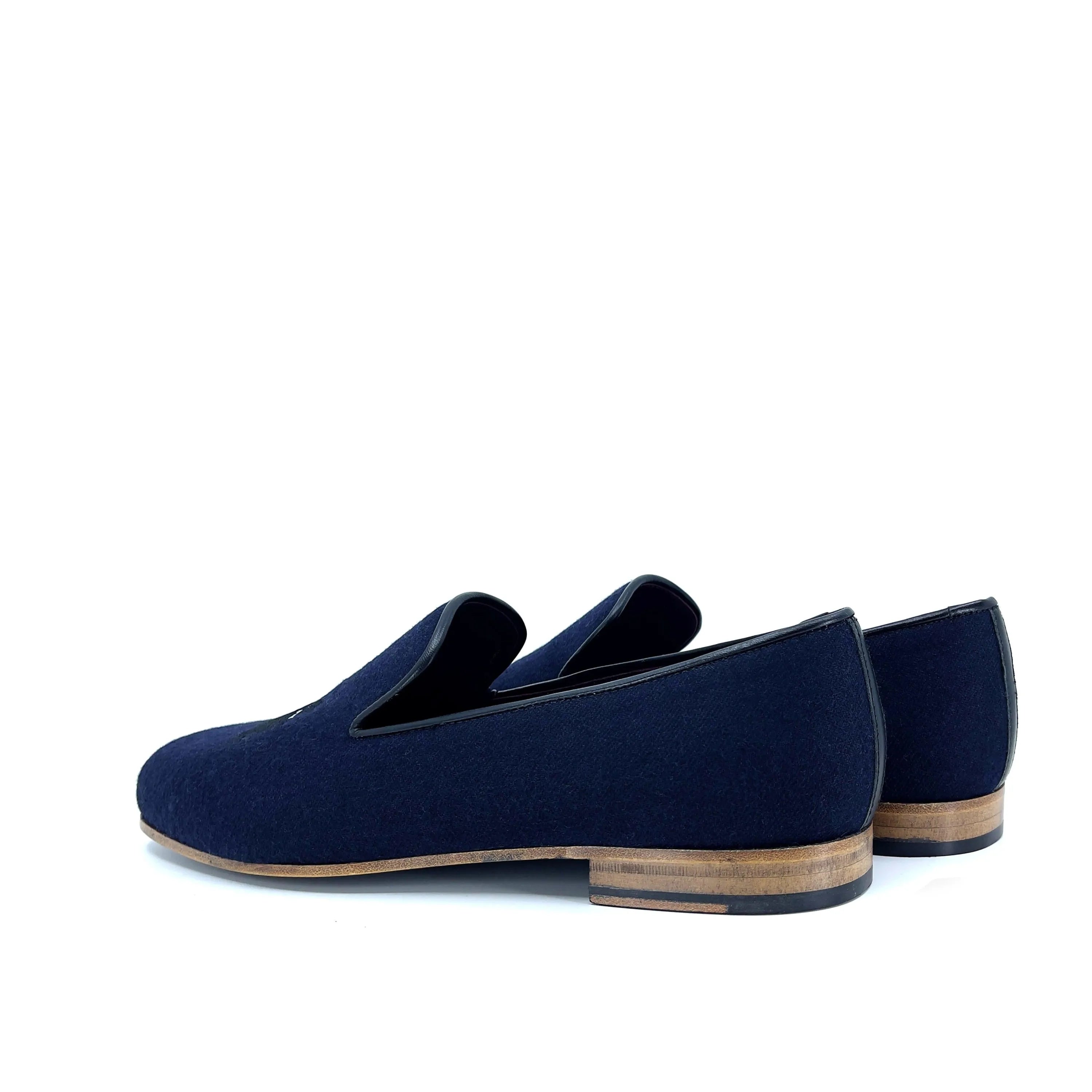Pair of navy blue DDrapper wellington slipon II loafers with leather sole