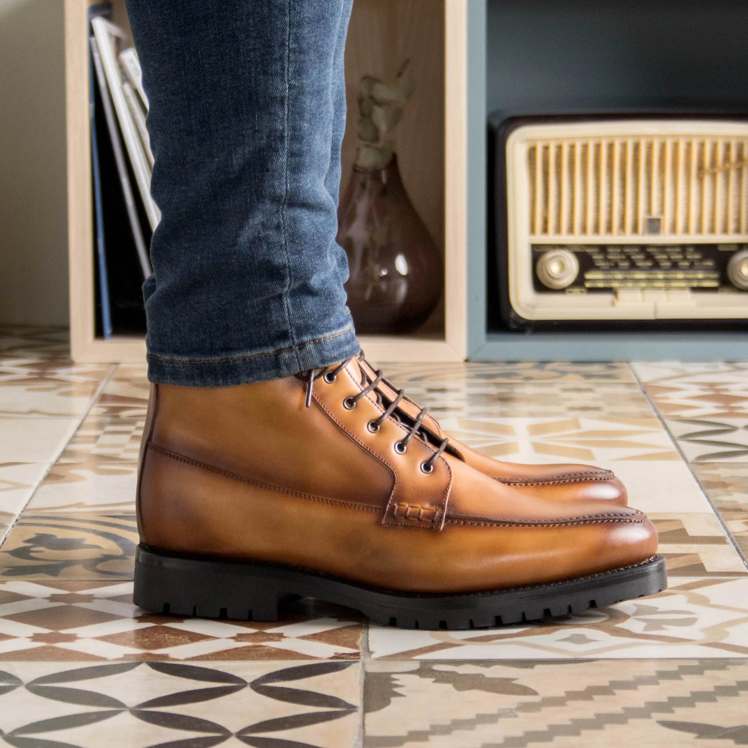 Brown Landon Moc boots with leather lace-up design