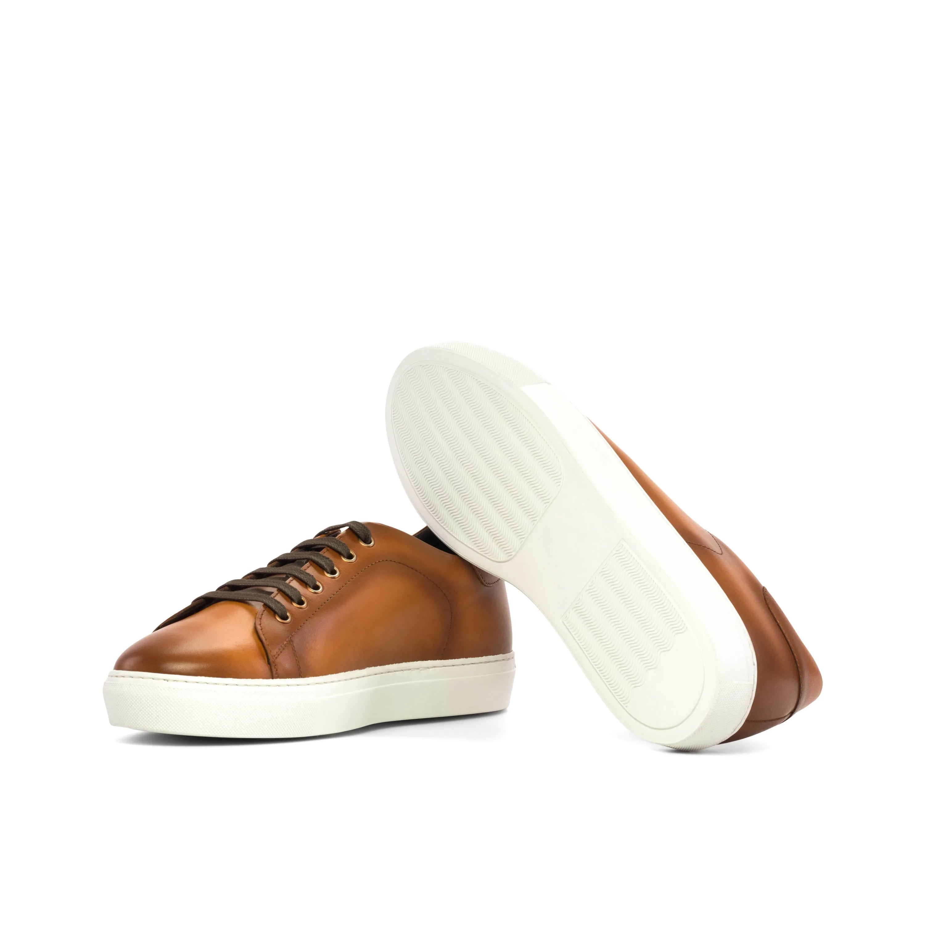 Pair of brown leather Lumin Trainer Sneaker cupsole trainers